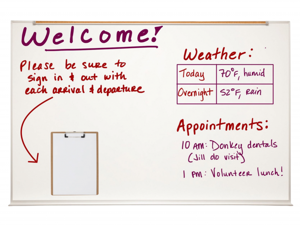 Left half of whiteboard reads "Welcome! Please be sure to sign in and out with each arrival and departure." Below the text is a clipboard. The right side has a spot to record the daytime and overnight weather and also has a spot to record the day's appointments.