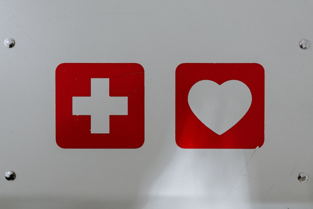 First aid kit with heart symbol