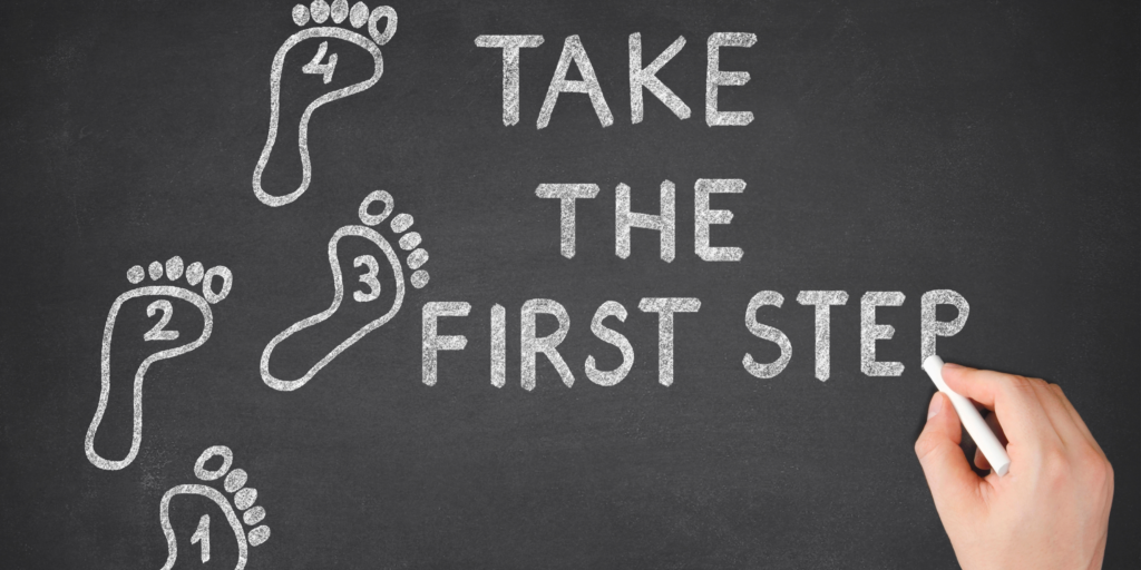 A chalk board reads "Take The First Step" and has four footprints to the left labeld, 1, 2,3, and 4.