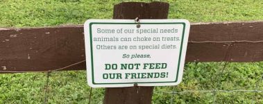 An instructional sign for visitors at Catskill Animal Sanctuary