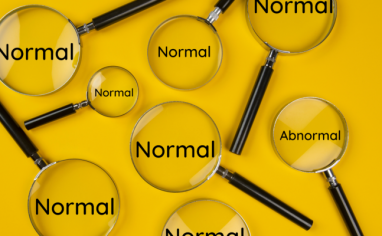 A yellow banner with eight magnifying glasses of different sizes containing the word "normal". One contains the word "abnormal".