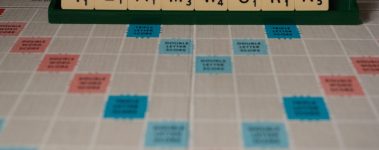 A game board with letters spelling out the word "teamwork."
